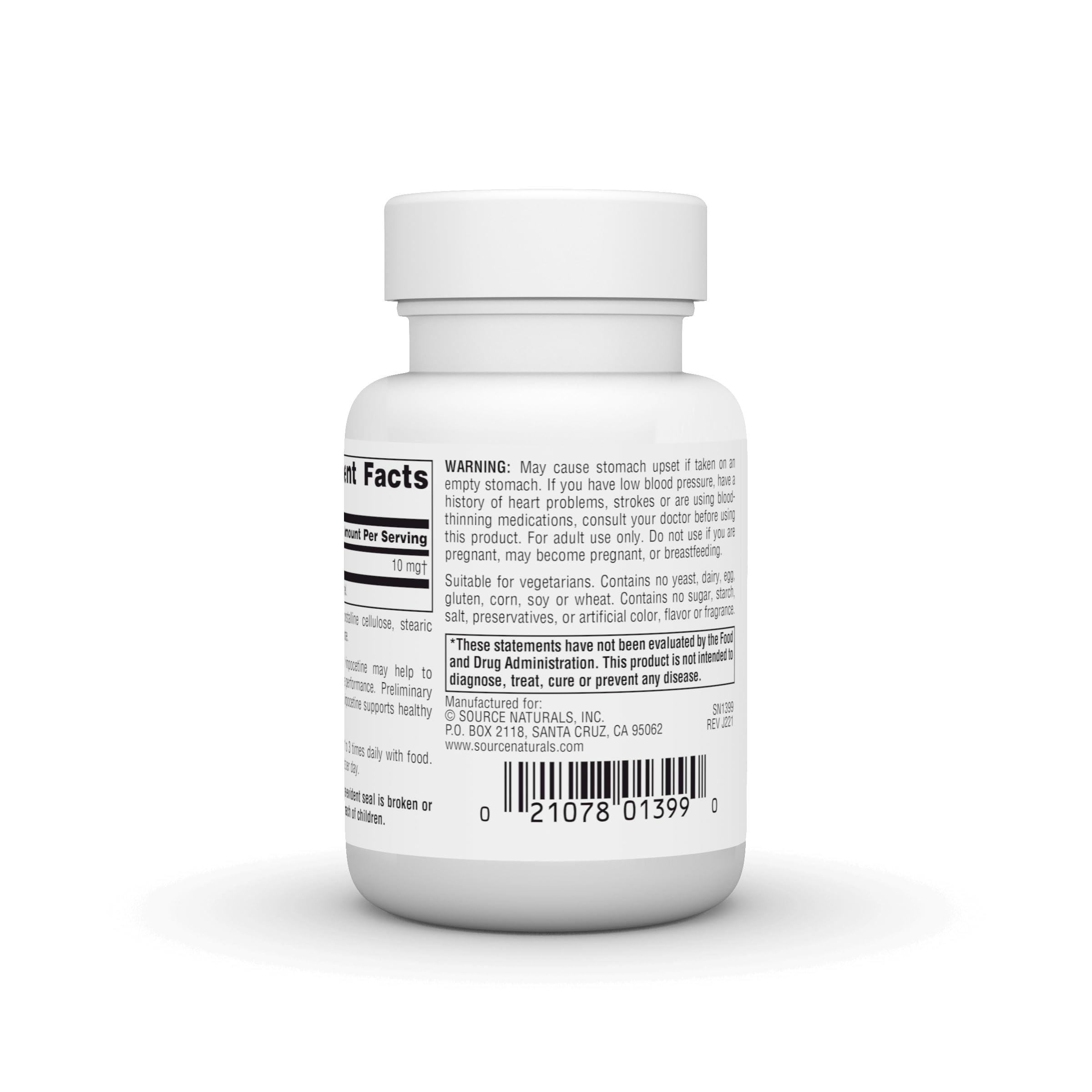 Source Naturals comprimidos junto a una moneda para comparar tamaño y facilidad de ingesta