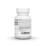 Source Naturals comprimidos junto a una moneda para comparar tamaño y facilidad de ingesta