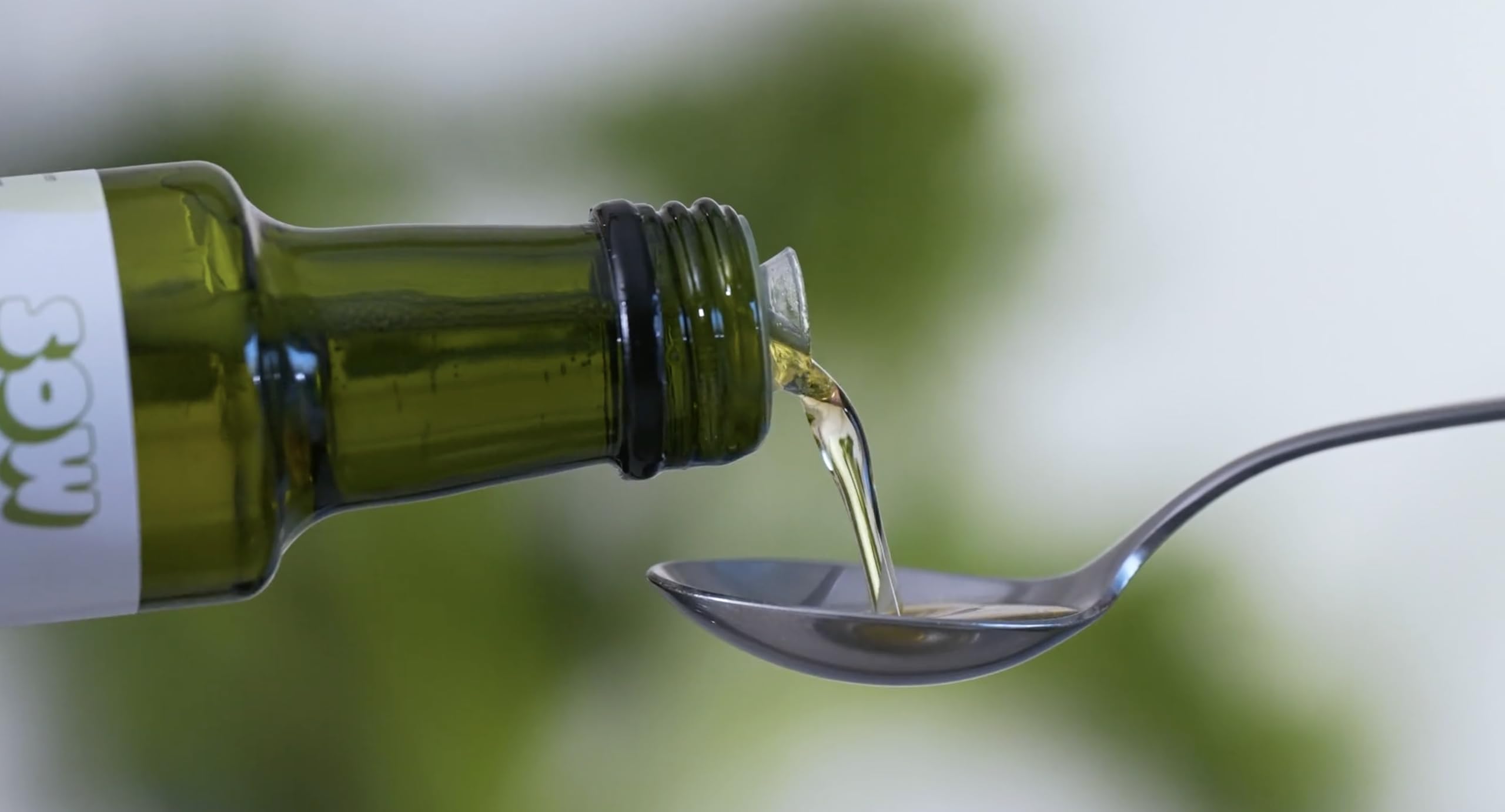 Seeds of Wellness botella 250 ml sobre fondo neutro, beneficio: conservación en vidrio