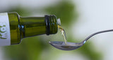 Seeds of Wellness botella 250 ml sobre fondo neutro, beneficio: conservación en vidrio