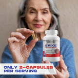 Spike Protein Detox cápsula en mano para comparar tamaño y conveniencia