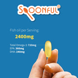 Spoonful cápsulas en mano para apreciar tamaño y dosis por porción