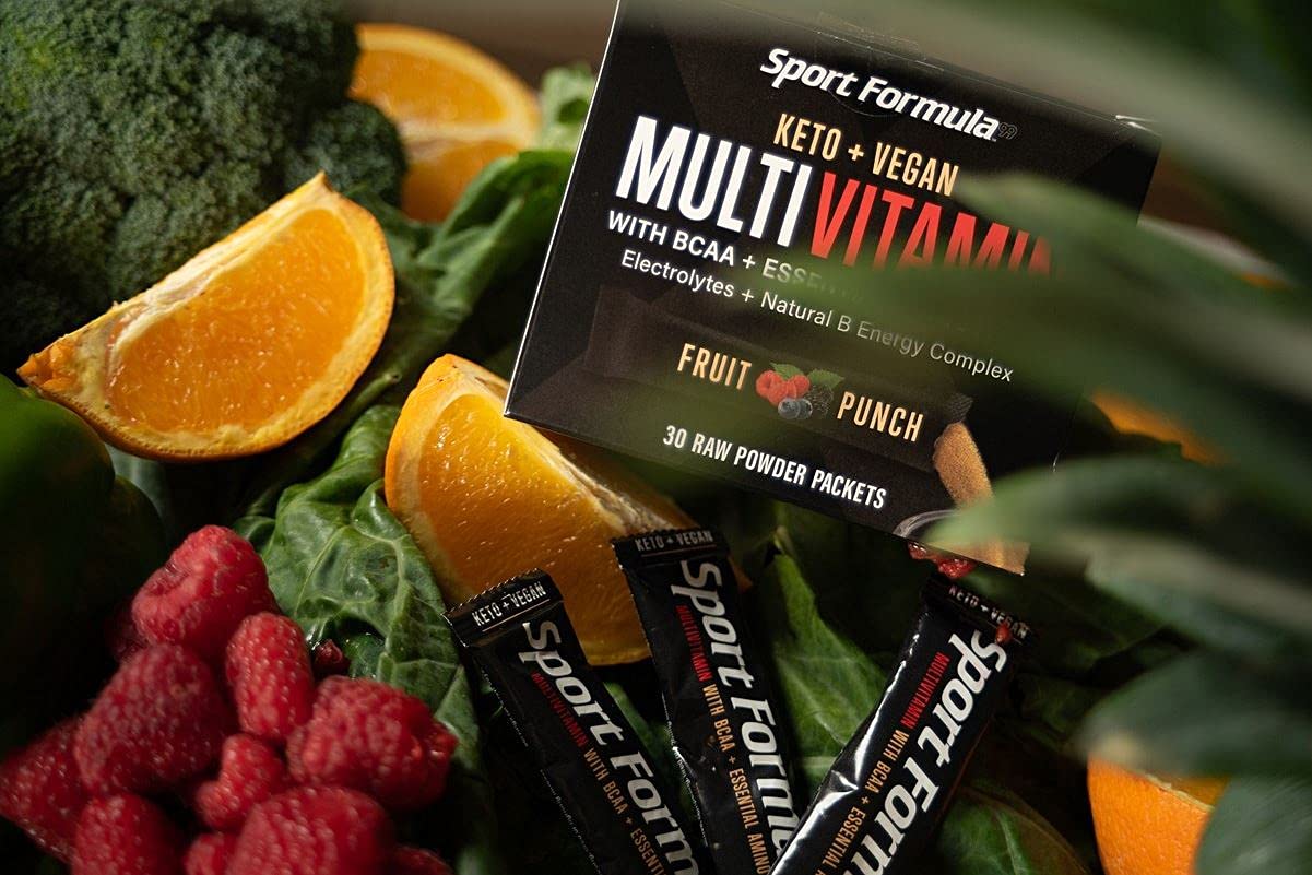 Sport Formula 99 sobre junto a mano, comparación de tamaño y porción portátil