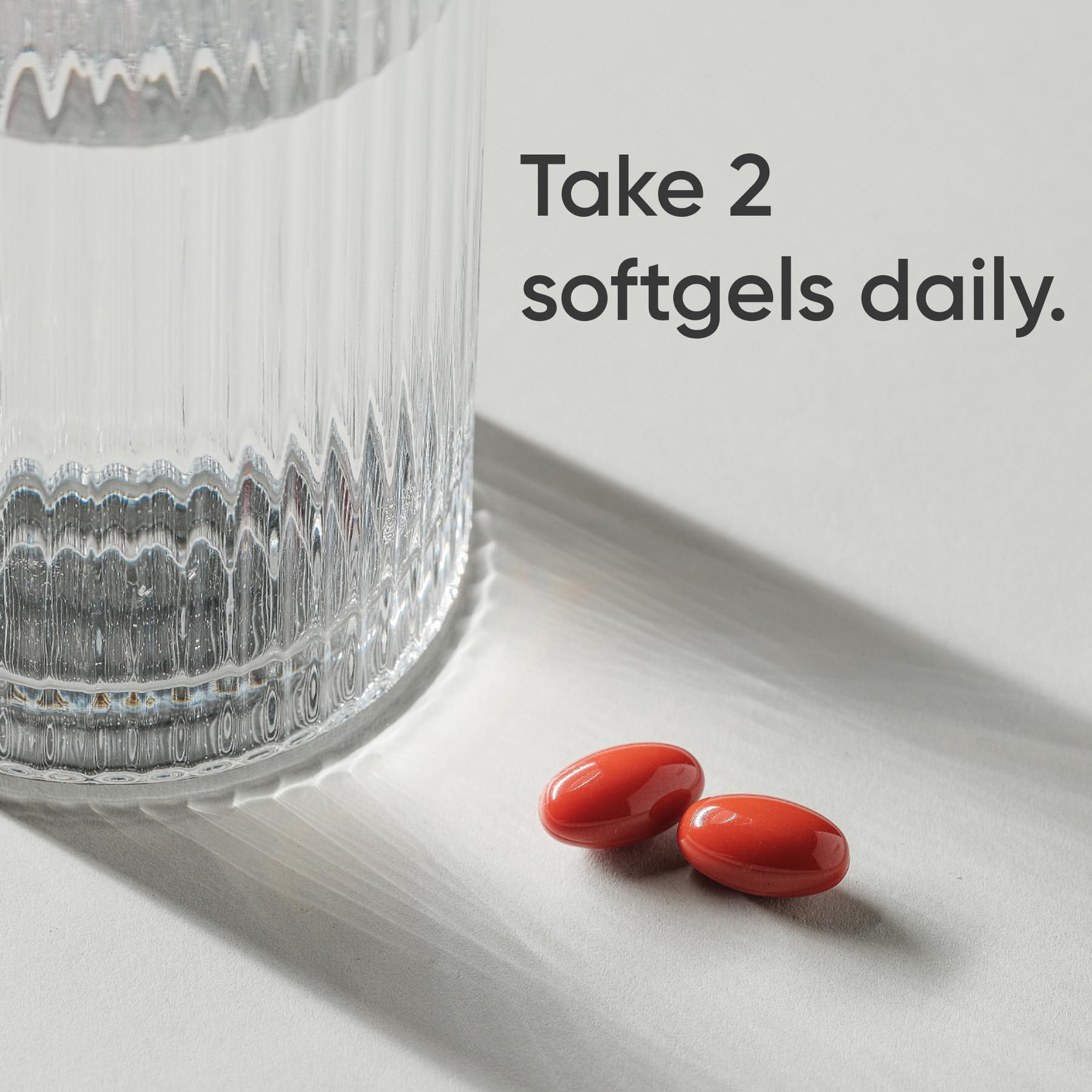Sports Research softgel en primer plano que destaca la fórmula fácil de tragar