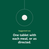 Standard Process Cal-Amo tabletas en mano para comparar escala y dosificación