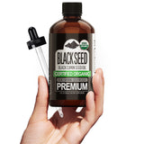 Sun Essential Oils botella frontal semilla negra, frasco ámbar práctico y protegido