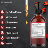 Superfood MD gotas vertidas en un vaso demostrando uso en bebida diaria