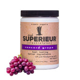 Superieur vista frontal del envase mostrando sabor Uva Concord y beneficios