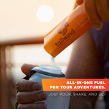 Tailwind Nutrition mezcla mandarina disolviéndose clara en agua sin residuos