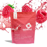 Tailwind Nutrition atleta bebiendo en ruta ilustra uso práctico y recuperación