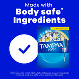 Tampax tampón junto a regla para comparar tamaño real