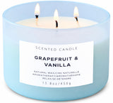 T&H vela Grapefruit Vanilla frontal en vaso azul, aporta elegancia y aroma