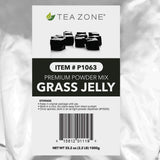 Tea Zone bolsa 2.2 lb junto a una mano para comparar tamaño