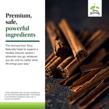 Terry Naturally Bacteril cápsula junto a moneda para comparar tamaño, indica dosificación clara