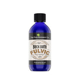 THE FOOD MOVEMENT CO. botella Black Earth en entorno natural, origen USA y calidad visible