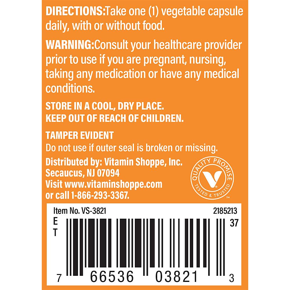 The Vitamin Shoppe cápsula en mano para comparar tamaño y conveniencia diaria