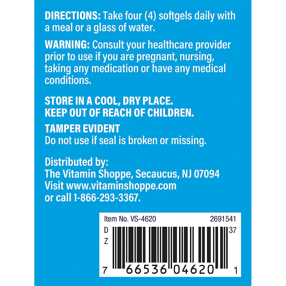 The Vitamin Shoppe softgel en mano para comparar tamaño y facilidad