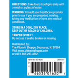 The Vitamin Shoppe softgel en mano para comparar tamaño y facilidad