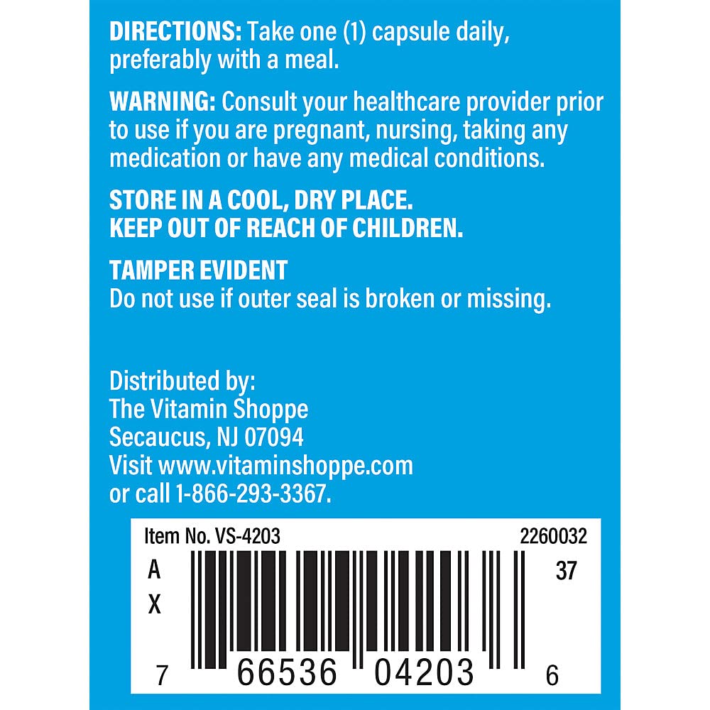 The Vitamin Shoppe frasco junto a un vaso de agua en contexto de uso diario