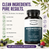 Thomas' all-natural Remedies cápsula junto a regla para comparar tamaño
