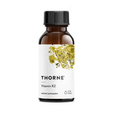 THORNE botella frontal K2 MK-4 mostrando diseño y tamaño fácilmente identificable
