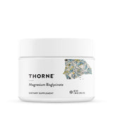 THORNE frasco del polvo de magnesio bisglicinato mostrando el envase y beneficios