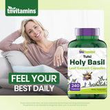 tnvitamins frasco junto a moneda para comparar escala y tamaño real del producto