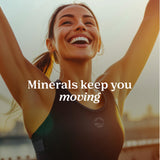 Trace Minerals tamaño de la tableta junto a monedas para escala clara