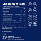 Trace Minerals gominola en mano para comparar tamaño y dosificación visual