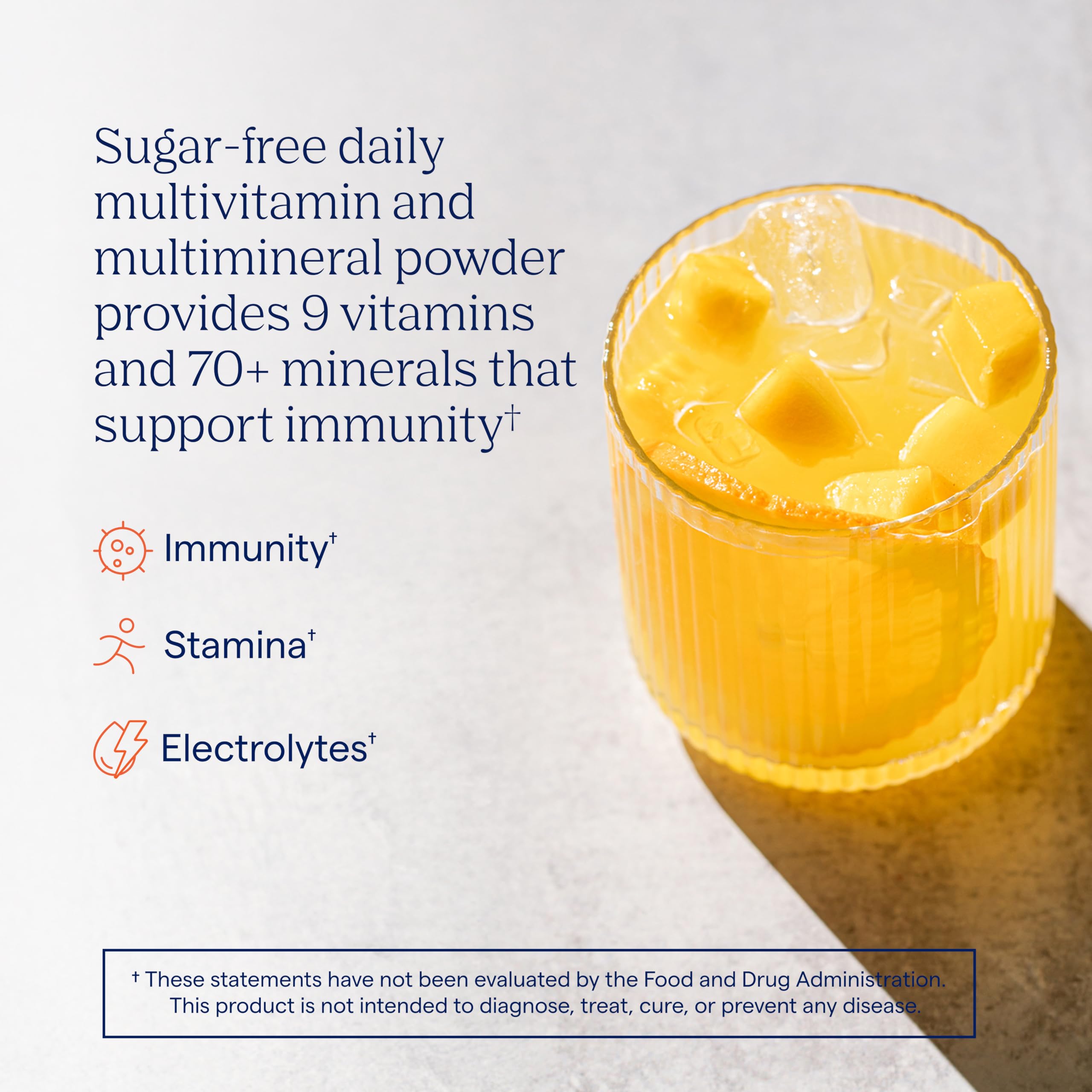 Trace Minerals polvo naranja-mango en primer plano, textura fina y disolución rápida