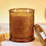 TRIRITE vela en vaso frontal mostrando diseño y vidrio reutilizable