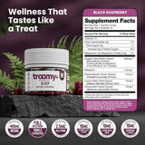 Troomy Nootropics una porción en mano para ilustrar tamaño y dosificación práctica