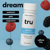 Tru Dream Shot comparado con teléfono para mostrar tamaño de 2 oz