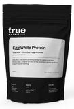 True Nutrition envase frontal mostrando sabor Chocolate Fudge Brownie y beneficio de proteína pura