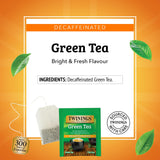 Twinings taza de té verde caliente con color amarillo miel y disfrute