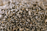 U.S. Wellness Naturals textura de hojas sueltas y sensación premium