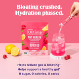 Ultima Replenisher polvo rosa textura fina en cucharada, mezcla instantánea sin grumos