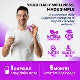 ULTRA HERBS cápsula junto a una moneda para comparar tamaño y facilidad