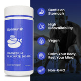 UpNourish cápsulas en uso junto a vaso de agua para integración diaria