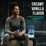 Vega cucharada medidora con una porción, claridad sobre 20 g de proteína
