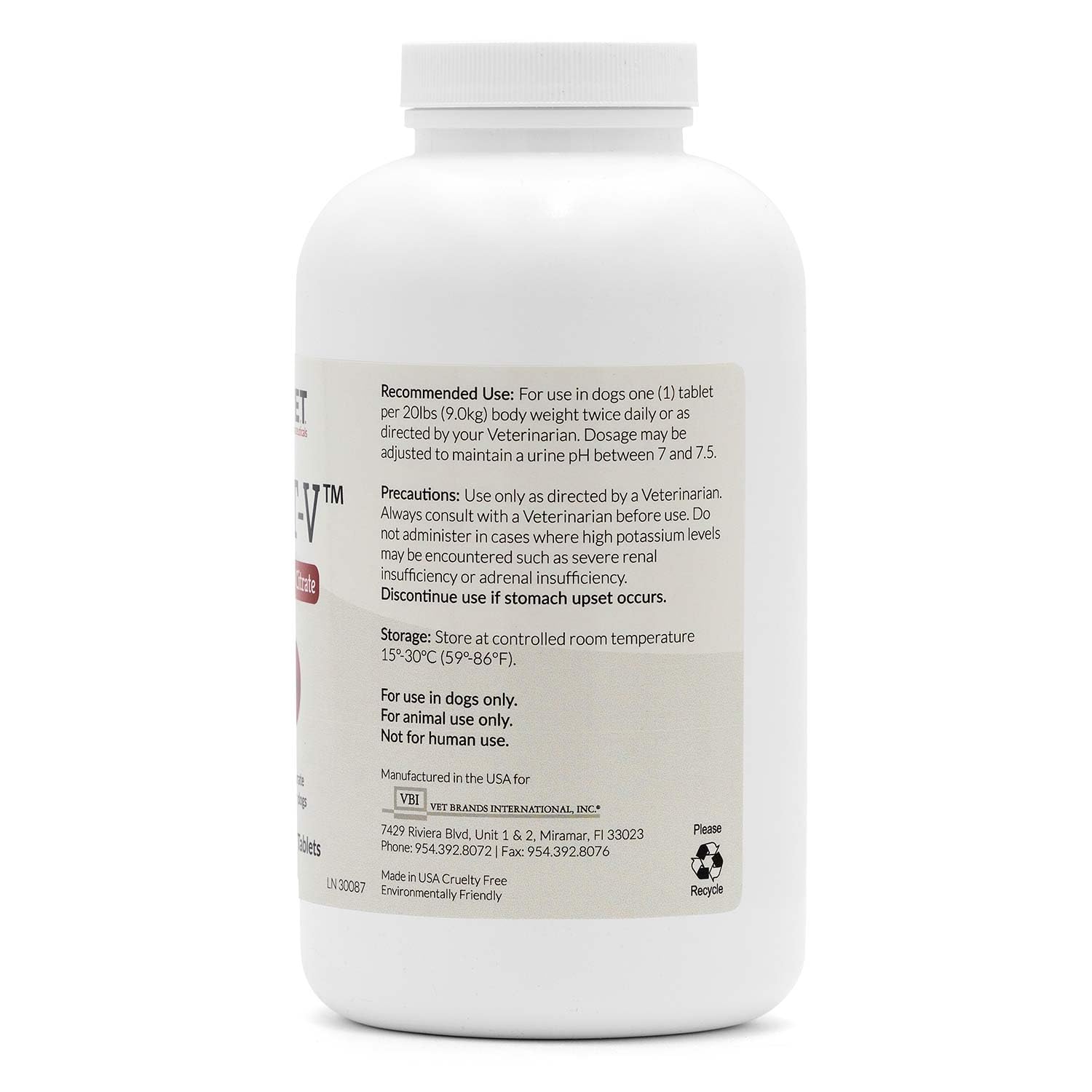 V.E.T. PHARMACEUTICALS primer plano de tableta K-CIT-V mostrando textura y tamaño