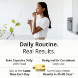 Vimerson Health cápsulas junto a un vaso de agua indicando toma diaria sencilla