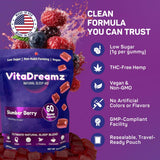 VitaDreamz tamaño comparación junto a moneda, beneficio: referencia visual para dosificar
