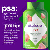 Vitafusion gomita junto a monedas para comparar tamaño real