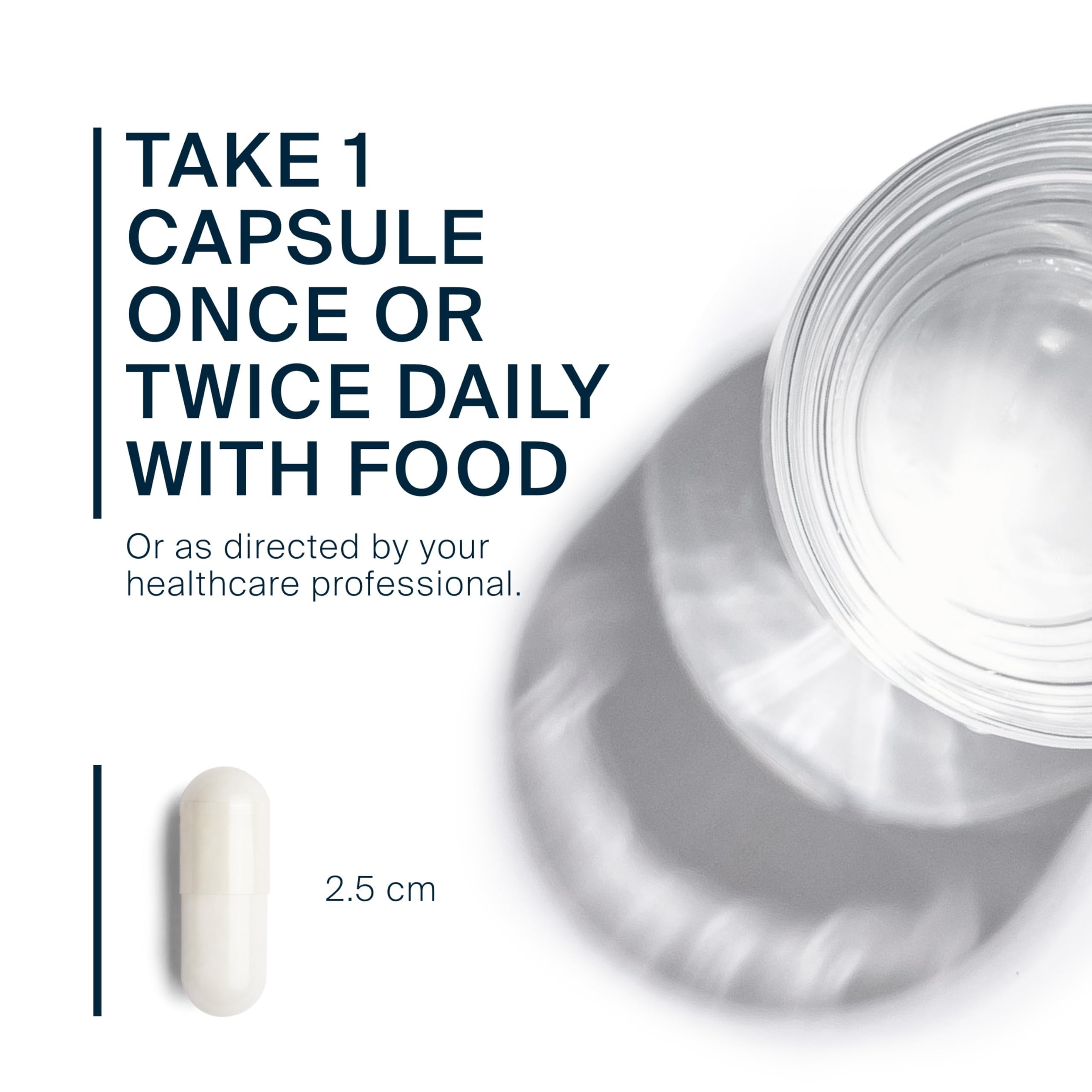 Vital Nutrients cápsula junto a una regla para comparar tamaño