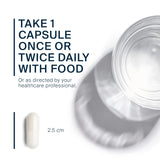 Vital Nutrients cápsula junto a una regla para comparar tamaño