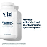 Vital Nutrients cápsula junto a una moneda para comparar tamaño y facilidad de ingesta