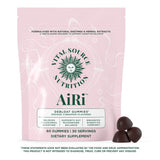 Vital Source Nutrition AiRi comparación de tamaño de la gomita junto a una moneda