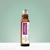 Detalle del rodillo y textura del aceite Vitality para aplicación suave y nutritiva