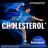 Vitamatic cápsula al lado de moneda para comparar tamaño y facilidad